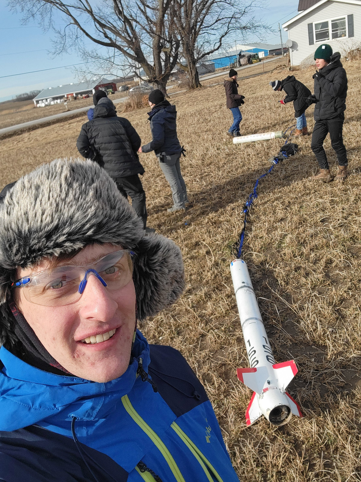 A hard landing and the visible cord connecting rocket sections after separation