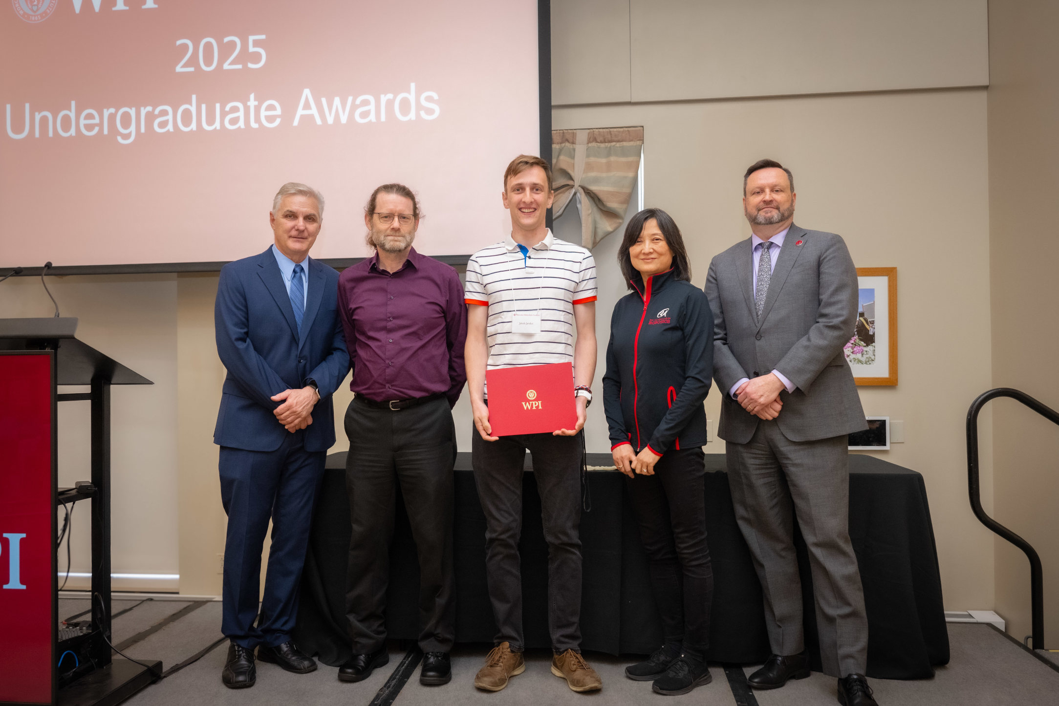 Jakub Jandus receiving the 2025 WPI Salisbury Prize